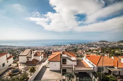 a view of a city from the roof of a building at Monte Vista Hermosa in Funchal