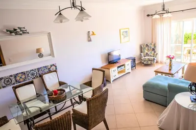 a living room with a couch and a table at Boavista Fairviews Village in Lagos