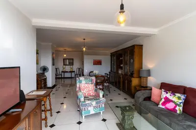 a living room with a couch and chairs at Magnolia Apartment Luxury Apt Great views in Funchal