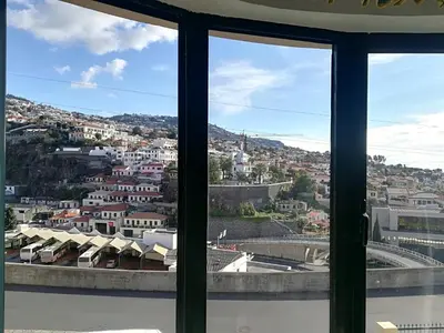 a view of a city from a window at Apartment Bay Historic Center in Funchal