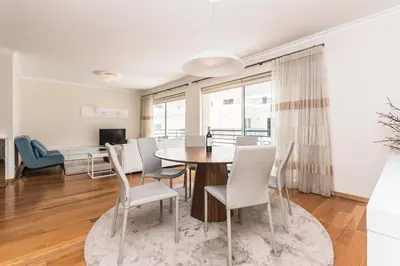 a dining room with a table and chairs at Costa Sol IX by Madeira Holiday Rentals in Funchal