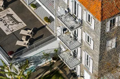 an overhead view of an apartment building with balconies at OurMadeira - Babosas Village in Funchal