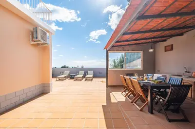 a swimming pool on the roof of a house at Funchal Bay View Villa by Homie in Funchal