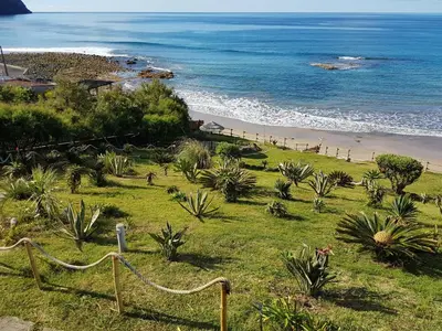 a view of a beach and the ocean at Villa Natura in Vila do Porto