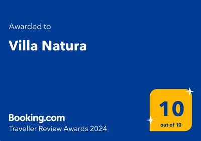 a yellow box with the textouched to villa nirvana at Villa Natura in Vila do Porto