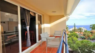 a balcony of a house with a view of the ocean at Dorisol I Casa Branca Apartment by Rentallido in Funchal