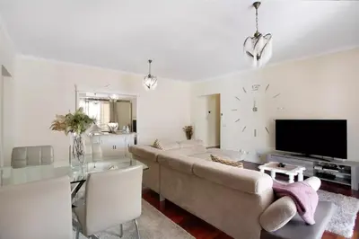 a living room with a couch and a tv at Dorisol I Casa Branca Apartment by Rentallido in Funchal