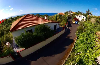 an aerial view of a house and a street at Quinta da quebrada in Santana