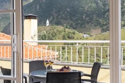 a view from a balcony with a table and chairs at Cantinho das Feiteiras by Homie in São Vicente