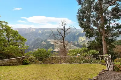 a view of the mountains from a park at The Perfect Cottage in São Vicente