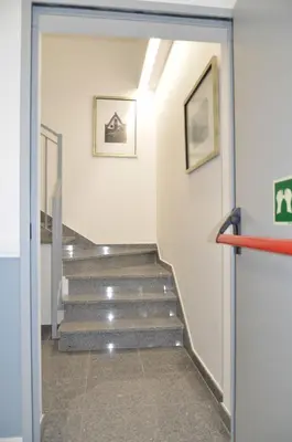 a hallway with stairs in a building at Edificio Charles 206 in Funchal