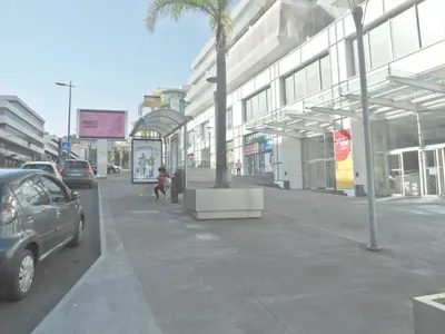 a city street with a car parked in front of a building at City Apartment in Funchal
