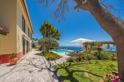 a villa with a view of the ocean at OurMadeira - Quinta D'Alegria in Funchal