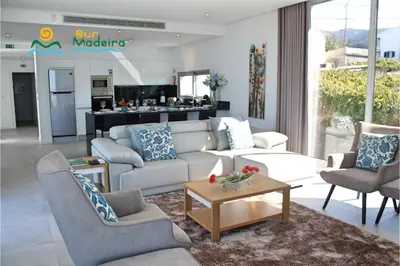 a living room with a couch and chairs and a table at OurMadeira - Calheta Heights in Calheta