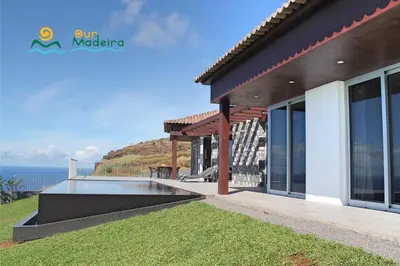 a house with a view of the ocean at OurMadeira - Cliffscape in Estreito da Calheta