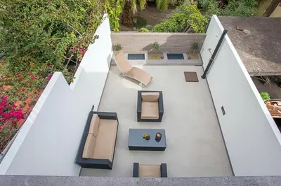an overhead view of a house with chairs and tables at Cayres Suites Surdo in Funchal