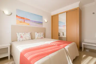 a bedroom with a large bed in a room at Boavista Golf & Spa - Bela Colina Holidays in Lagos