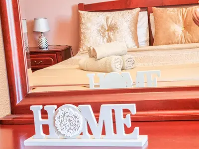 a sign that reads hotel in front of a bed at Casa da Achada in Arco da Calheta in Arco da Calheta
