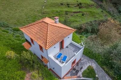 an overhead view of a house with an orange roof at Cantinho Rural in Camacha