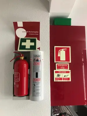 a red fire hydrant next to a red box at Casa Silva in Calheta