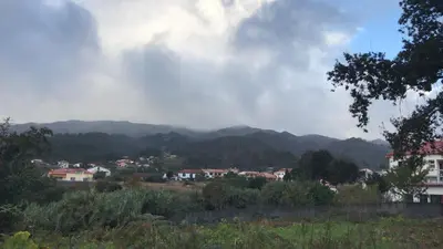 a view of a town with mountains in the background at Casa da Maria in Prazeres