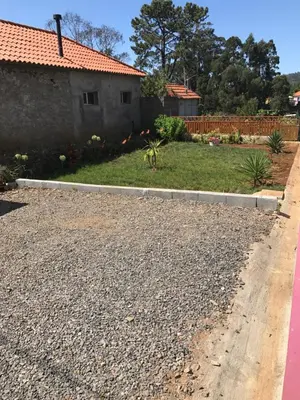 a driveway in front of a house at Casa da Maria in Prazeres