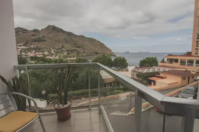 a balcony with a view of a mountain at Residencial Familia in Machico