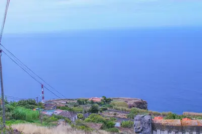 a view of the ocean from the top of a hill at House of Massapez | Calheta in Fajã da Ovelha