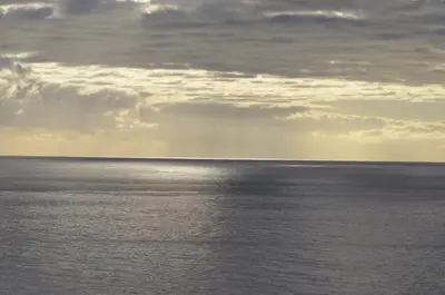 a view of the ocean under a cloudy sky at Estalagem Da Ponta Do Sol in Ponta do Sol