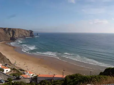 a view of a beach with people on it at Villa Bartoni in Aljezur