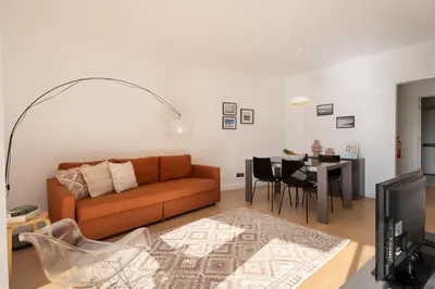 a living room with a couch and a table at Varandas do Funchal I by An Island Apart in Funchal