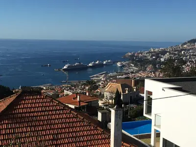 a view of the ocean from a city at Boa Nova base. in Funchal