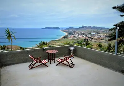 a shower with a glass door in a bathroom at Porto Santo Balcony View House in Porto Santo