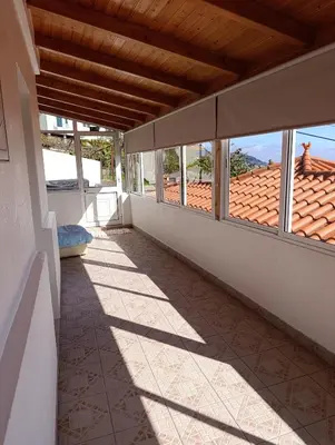 a hallway of a house with a view of a roof at The Hill View House in Funchal