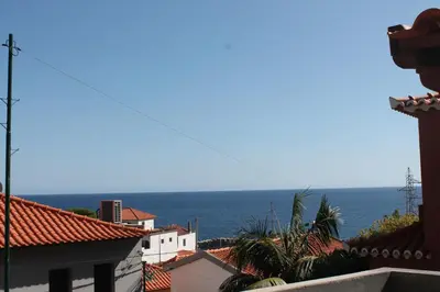 a view of the ocean from a building at Casa da Fininha in Calheta