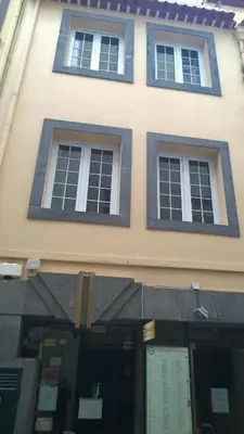 a building with three windows on top of it at Central Suite in Funchal 1N in Funchal