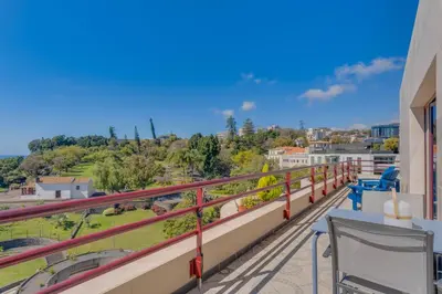 a balcony with a view of a city at Funchal Marina Bay in Funchal