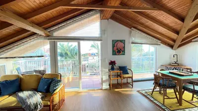 a living room with a couch and a table at Porto Moniz Villa in Porto Moniz
