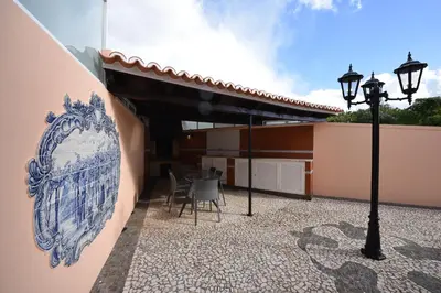 a wall with a mural on the side of a building at Villa Chaves in Funchal