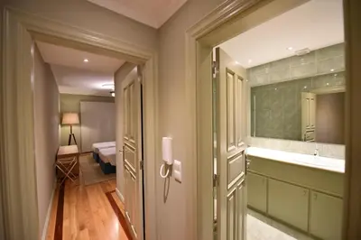 a bathroom with a sink and a mirror at Villa Chaves in Funchal