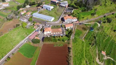 an aerial view of a large estate with a house at Charming Studio with Sea View - Ponta do Pargo - 20 m² in Ponta do Pargo