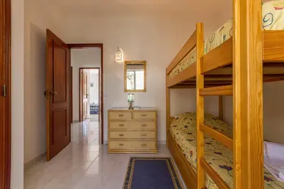 a bathroom with a sink and a toilet and a tub at Casa Tulipa in Luz
