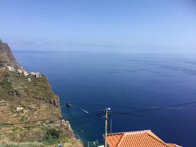 a view of the ocean from a mountain at Guesthouse-TheView in Ribeira Brava