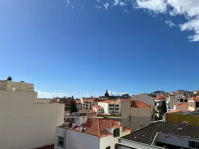 a view of a city from a building at Funchal Downtown Flats 2 in Funchal