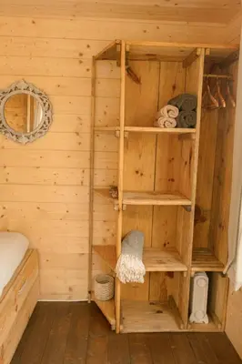 a wooden sauna with wooden shelves in a room at Soul Farm Algarve - Glamping & Farm Houses in Aljezur
