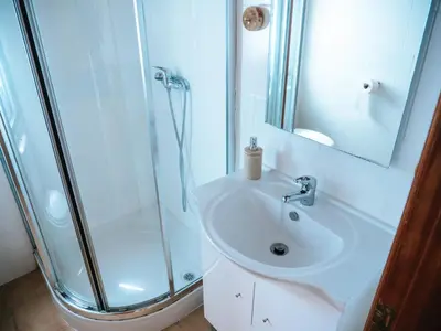 a bathroom with a sink and a shower at Soul Farm Algarve - Glamping & Farm Houses in Aljezur