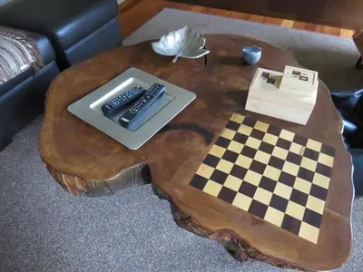 a coffee table with a chessboard on top of it at Solar do Carvalho in São Vicente