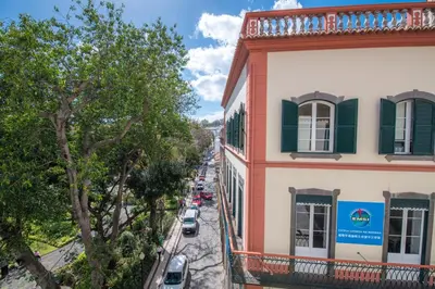 a view of a street from a balcony of a building at Funchal Arcadas Apartment by MLV in Funchal
