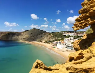 a view of a beach with white buildings at Casa Aromas do Mar, Burgau in Burgau