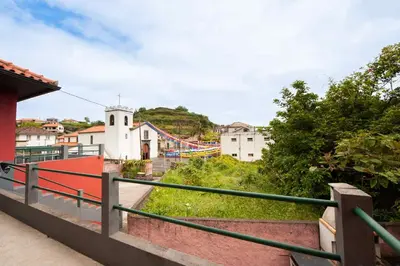 a view of a city with a bridge in the background at Casa reizinho in Santana